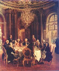 Voltaire en la corte de Federico II de Prusia, de Adolph von Menzel, Voltaire est a la derecha. En este siglo abundaron las tertulias, banquetes y reuniones, en los que se difunda la nueva cultura de los ilustrados.